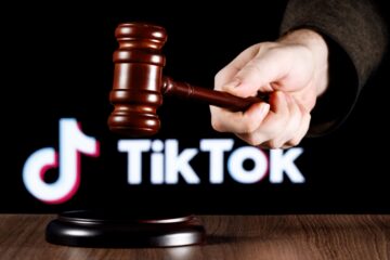 Tik Tok symbol and a gavel; orange county business law